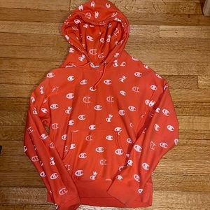 Champion coral hoodie in size medium